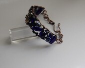 copper wire cuff bracelet with a colorful mix of cobalt beads