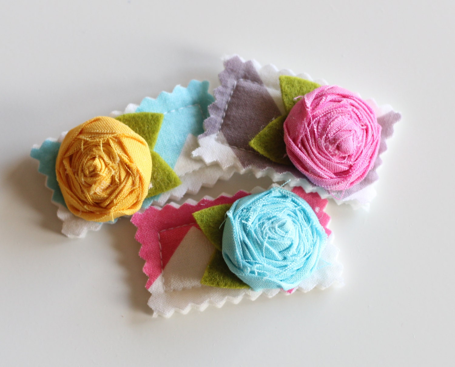 pink yellow and teal flowers - set of 3 snap clips