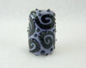 Handmade colored clay focal bead jewelry supplies purple porcelain clay bead with black swirls and raised dots jewelry and beading supplies