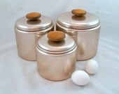 A Set of Mid-Century Mirro Coppertone Anodized Aluminum Kitchen Canisters