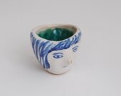 Girl's head tiny ceramic bowl in blue, white and turquoise