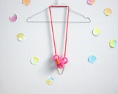 Chain reaction, crochet chain necklace. Neon pink, orange, red. Nautical style.