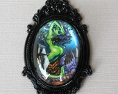 Green Siren Sexy Mermaid in Black Ornate Oval Brooch
