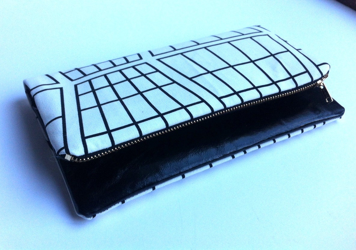 Limited edition multi style leather clutch bag with monochrome print fabric, small
