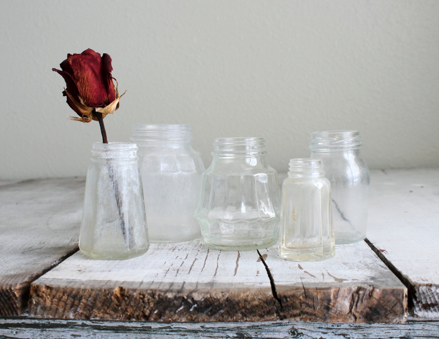 Collection of five vintage glass bottles