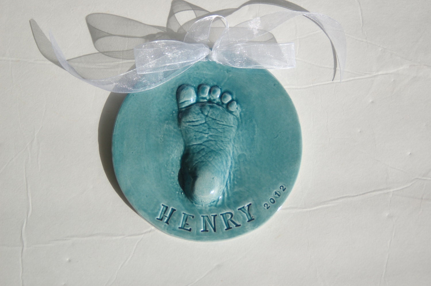 footprint 3-D ornament in ceramic  with mold Included