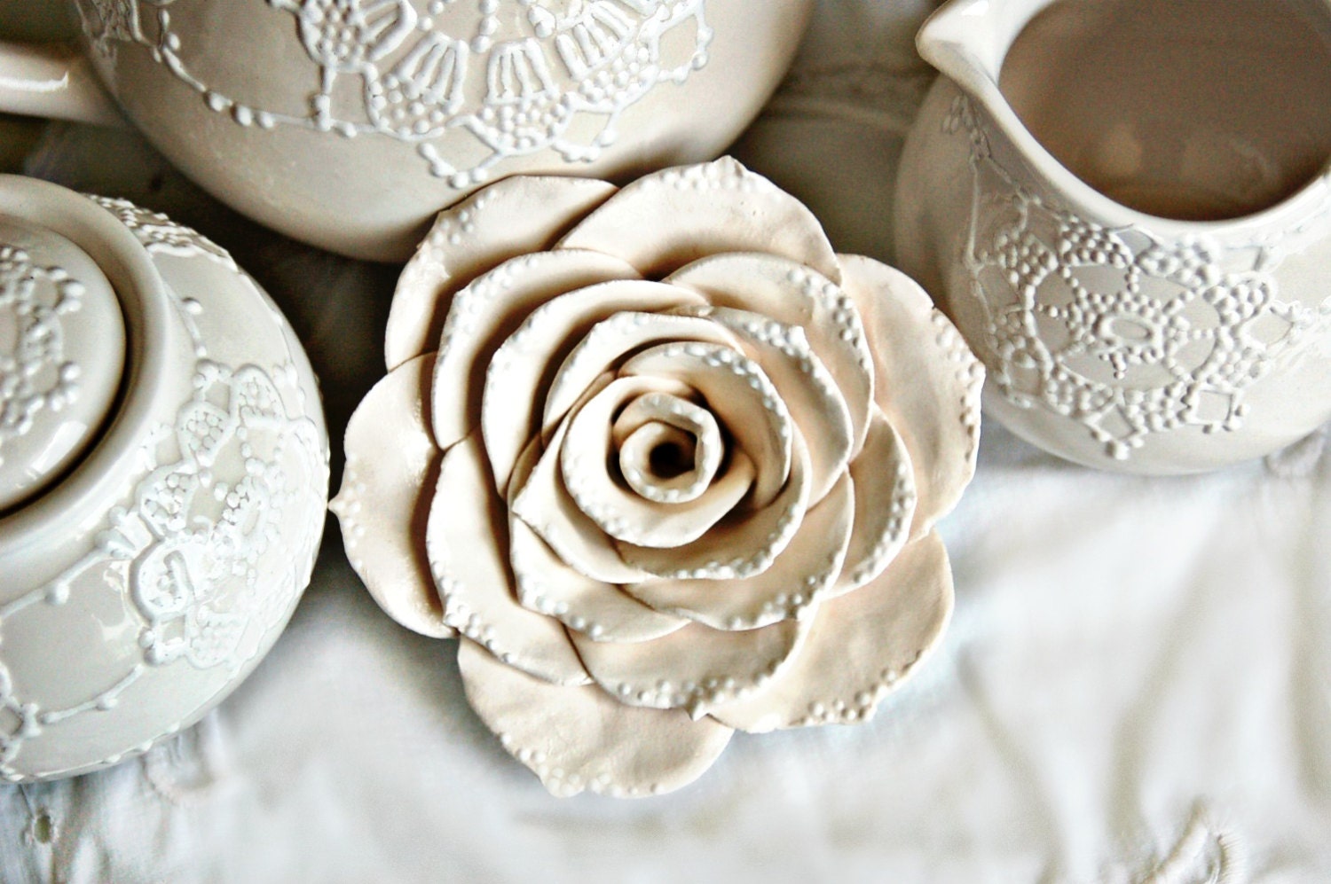 Ceramic rose in cream white with added dot detailing