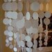 Paper chandelier or mobile.  Beautiful for weddings, nurserys, or party decorations (made to order).