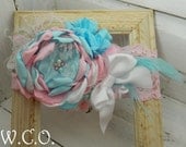 the TIFFANY Couture Boutique Style Flower and Rosette Stretch Lace Headband in Pink, Aqua and White
