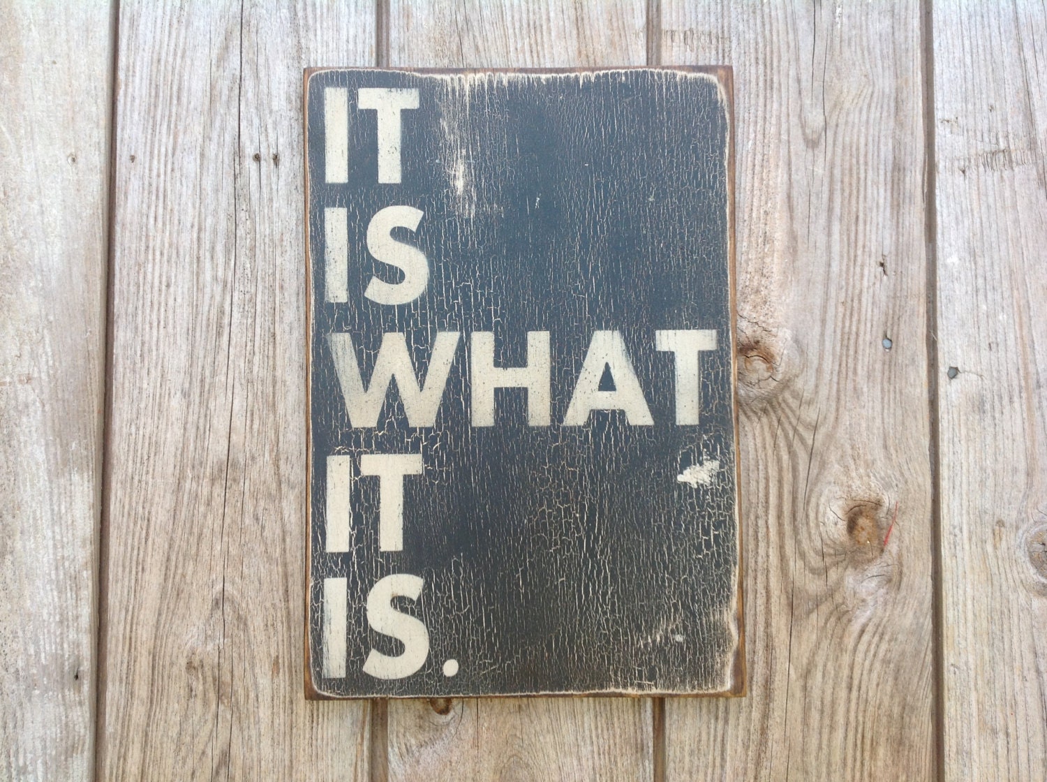 Wooden sign It is what it is sign made from reclaimed plywood