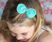 teal with white polkadot knot bow