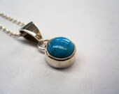 round turquoise pendant