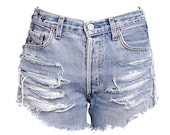 L.A distressed high waisted vintage ripped and studded levi cut offs tumblr