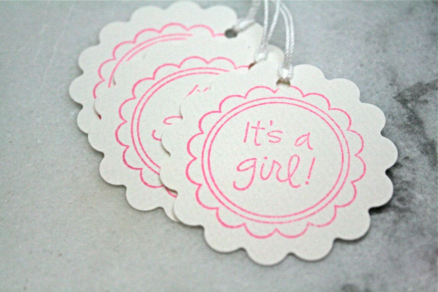 Baby shower favor tags, 25, with hand-stamped message.  Sweet pink "It's a Girl" on white card stock.