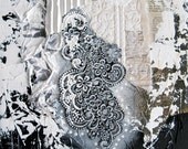mixed media painting in black and white. echoes of spring.