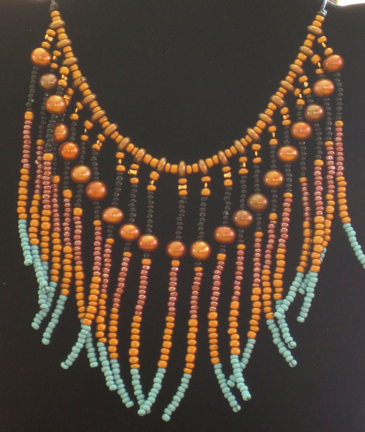Native American style tribal fringed collar necklace in turquoise and gold pearl