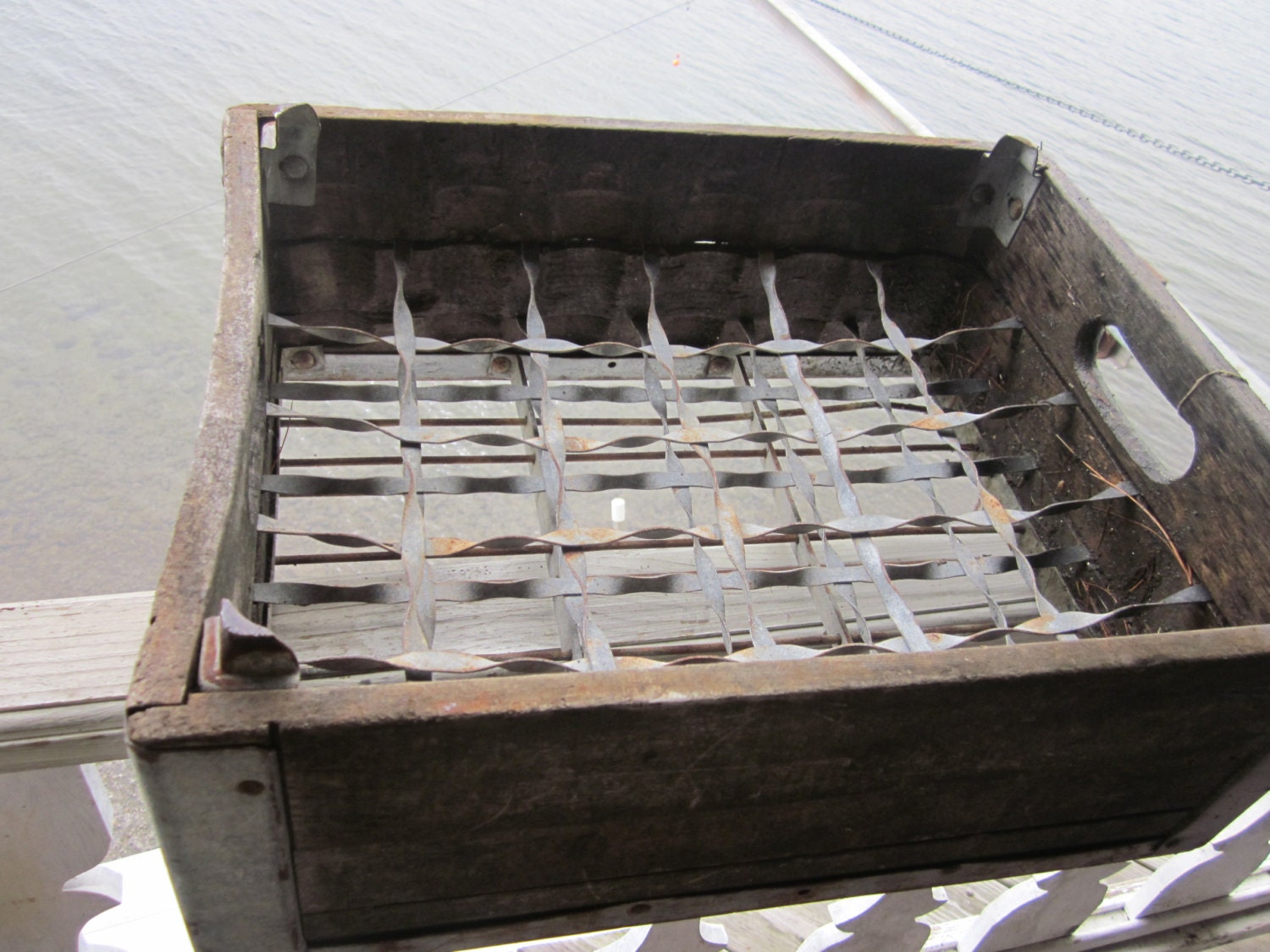 antique milk crate, milk bottle holder, wood/ steel wine rack, magazine holder industrial