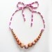 Color Pop Necklace in Hazelnut & Pink Stripe . Non-toxic Beads with a Jersey Tie . Fashionable and baby-friendly