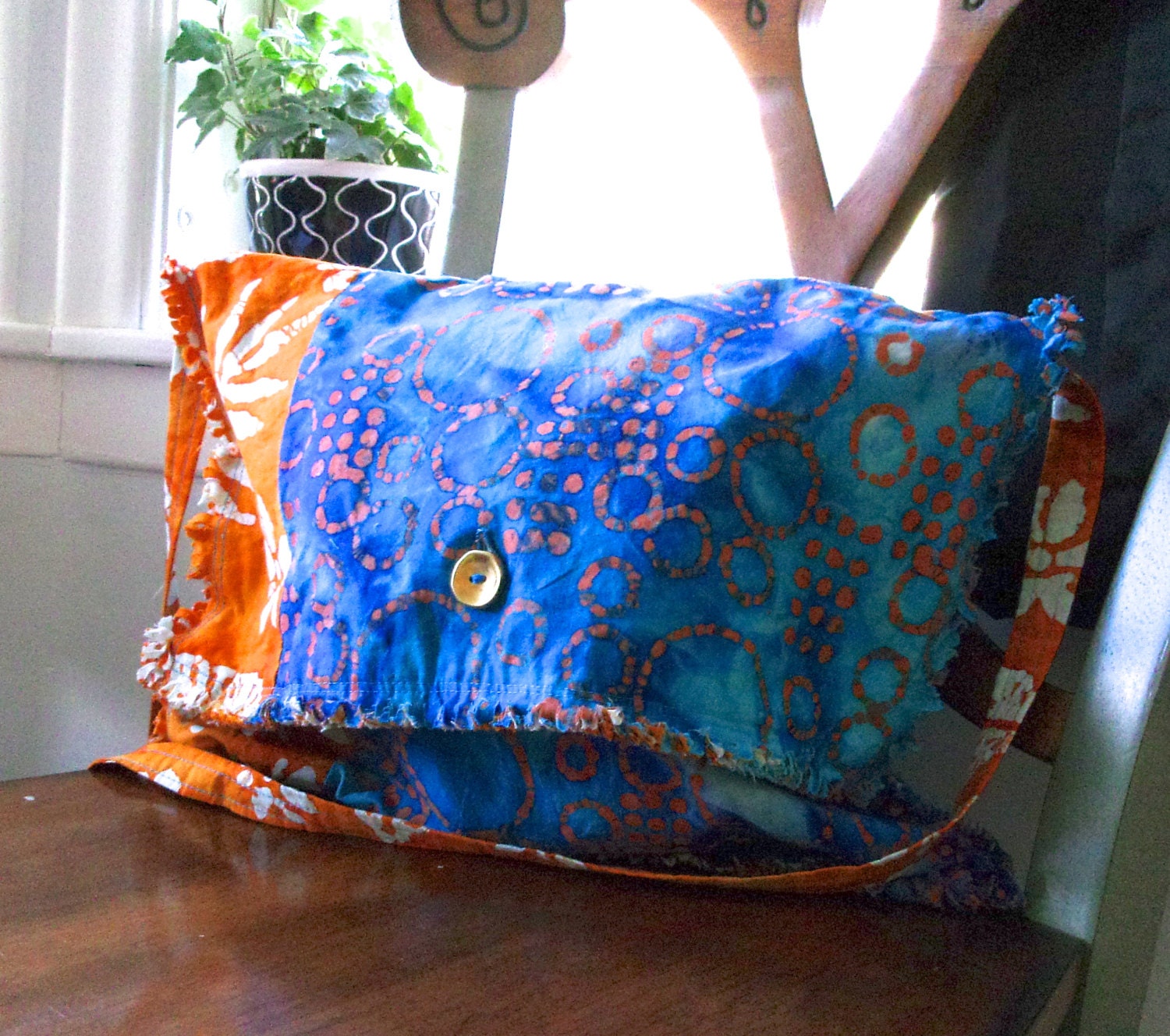 Fringe is fun handmade messenger bag in blue and orange batik