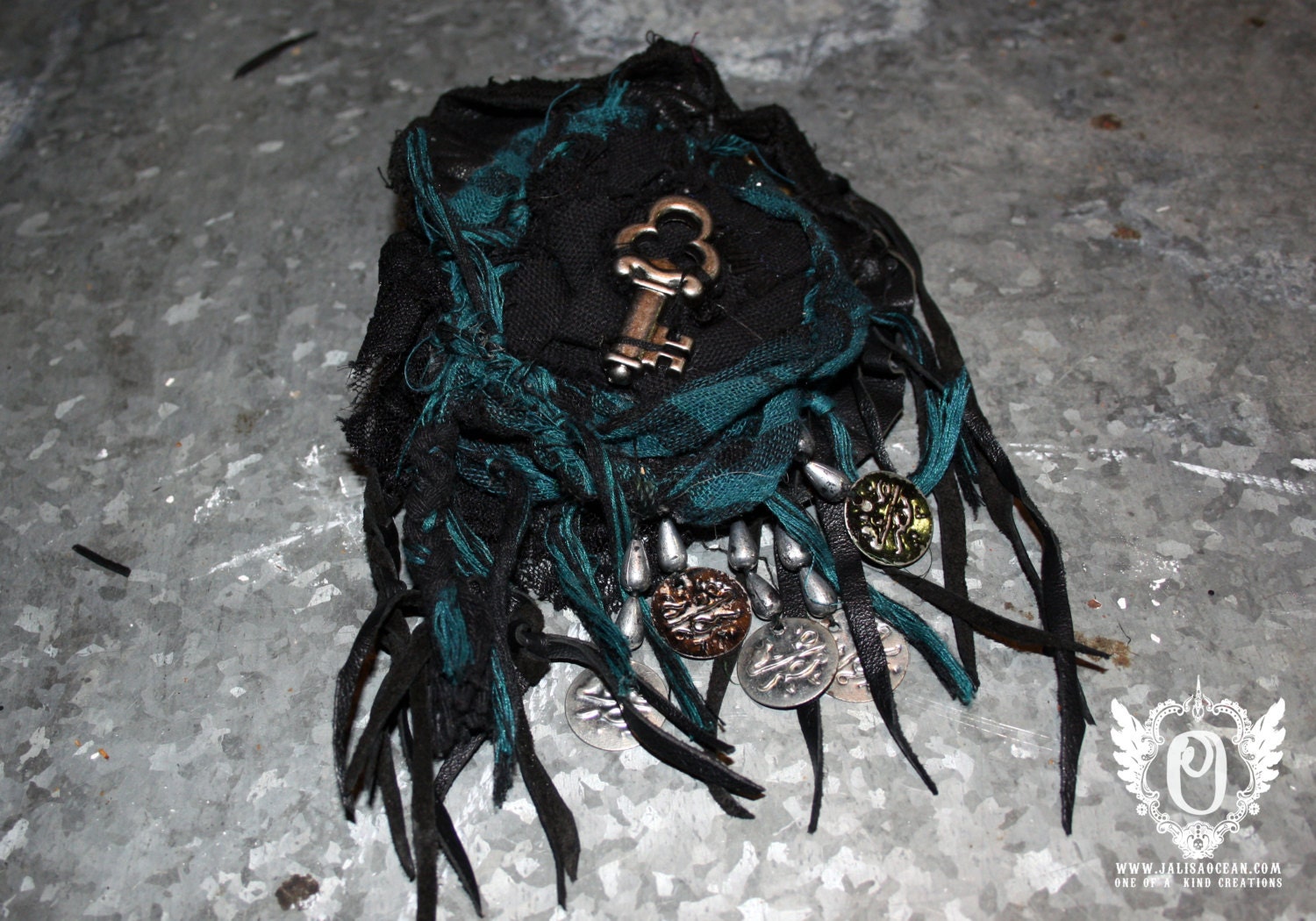 Rugged Turquoise n Black Leather Tassle Clip Studded with Charms and Key. Hair, Garter, Scarf Clip
