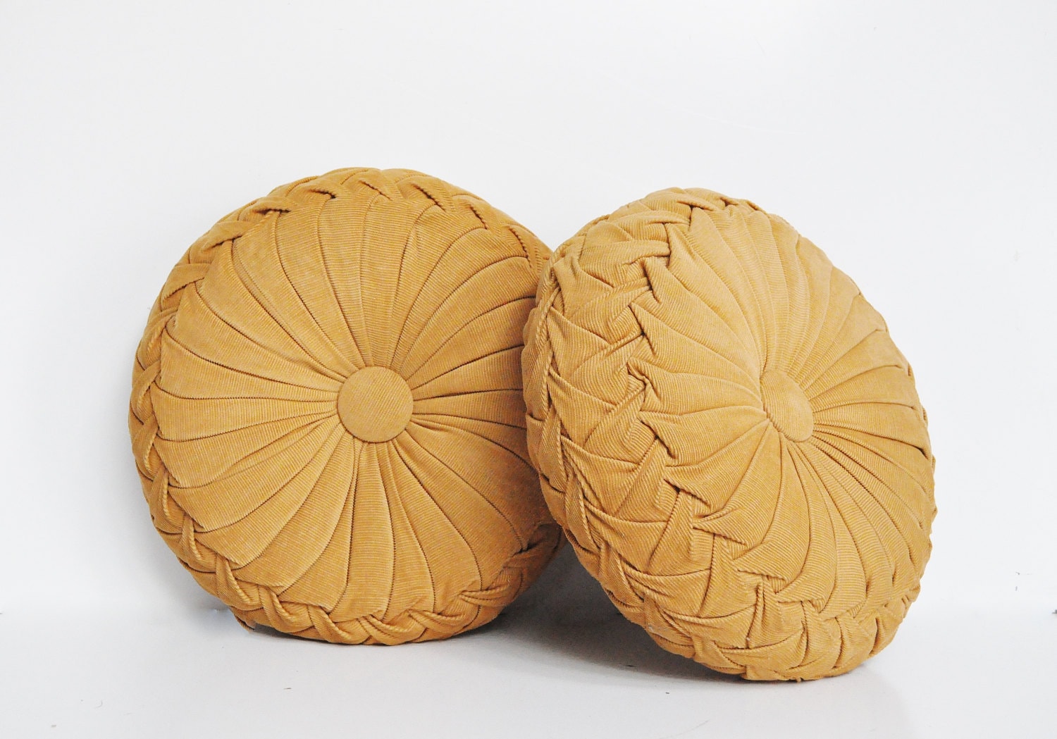 Pair of Vintage Smocked Pillows Round Pillows by thewhitepepper