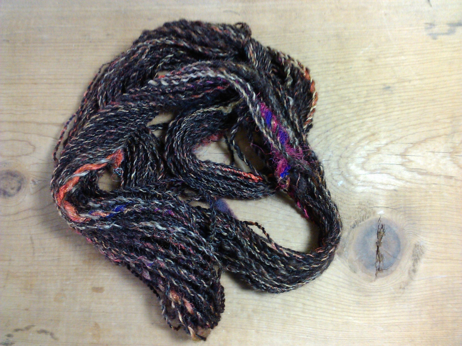 Handspun Border Leister silk mohair blend yarn with large silk slubs
