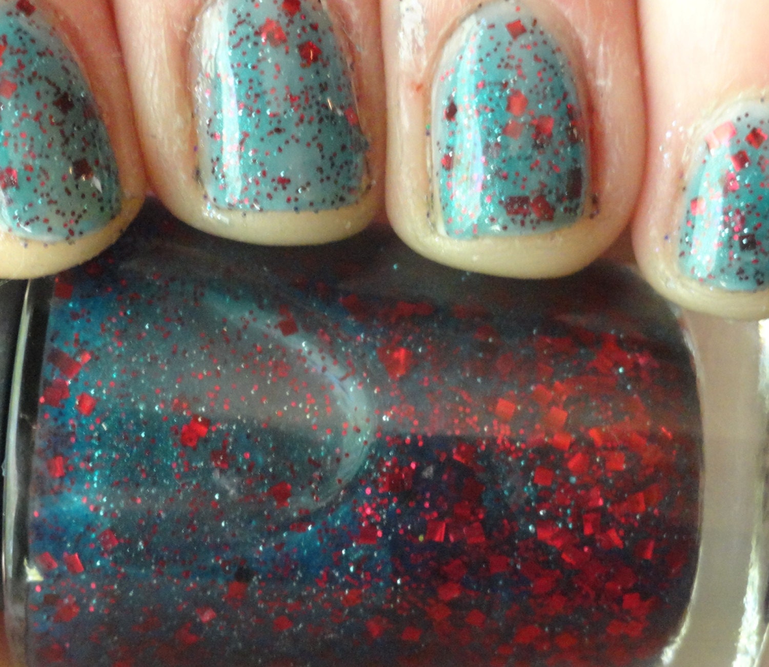 A Scarlet Thirst Vampirella Series Indie Franken Nail Polish Blue with Red Glitter