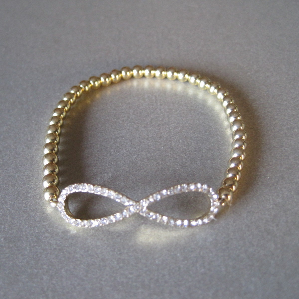Infinity CZ Gold Beaded Bracelet