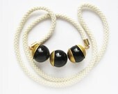 NEW - Ivory Mokuba rope and three onix beads