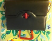 vintage 1950s mid century black handbag with bakelite handle & clasp