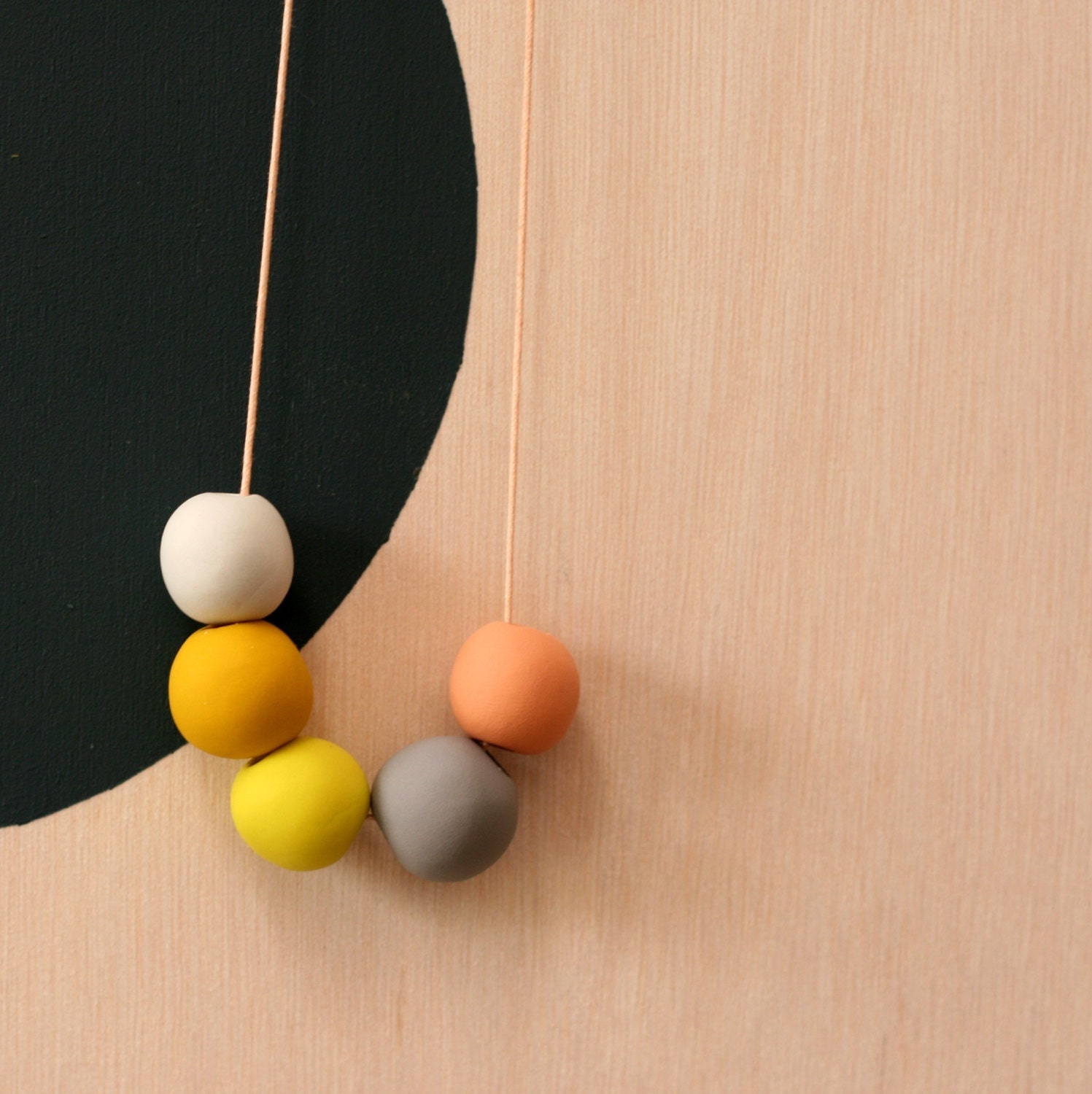 not quite round handmade beads make a necklace