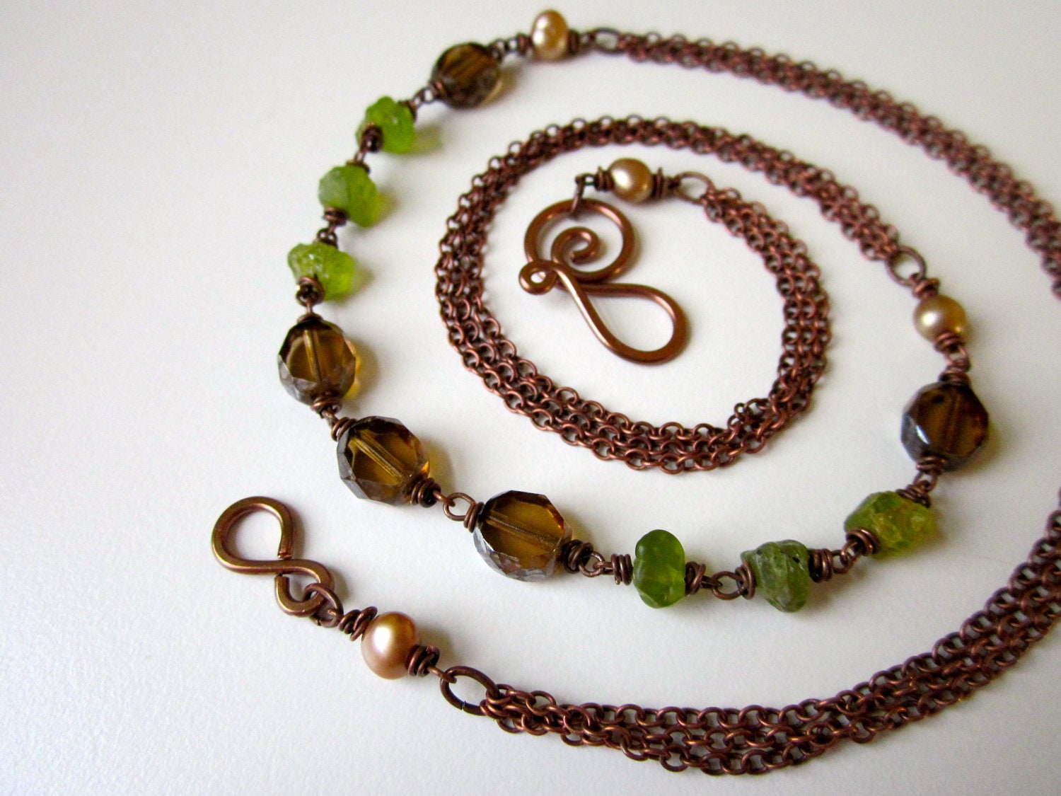 Terroir - mossy green peridot raw gemstone nuggets, foggy gray Czech glass beads, caramel freshwater pearls, & copper layered necklace