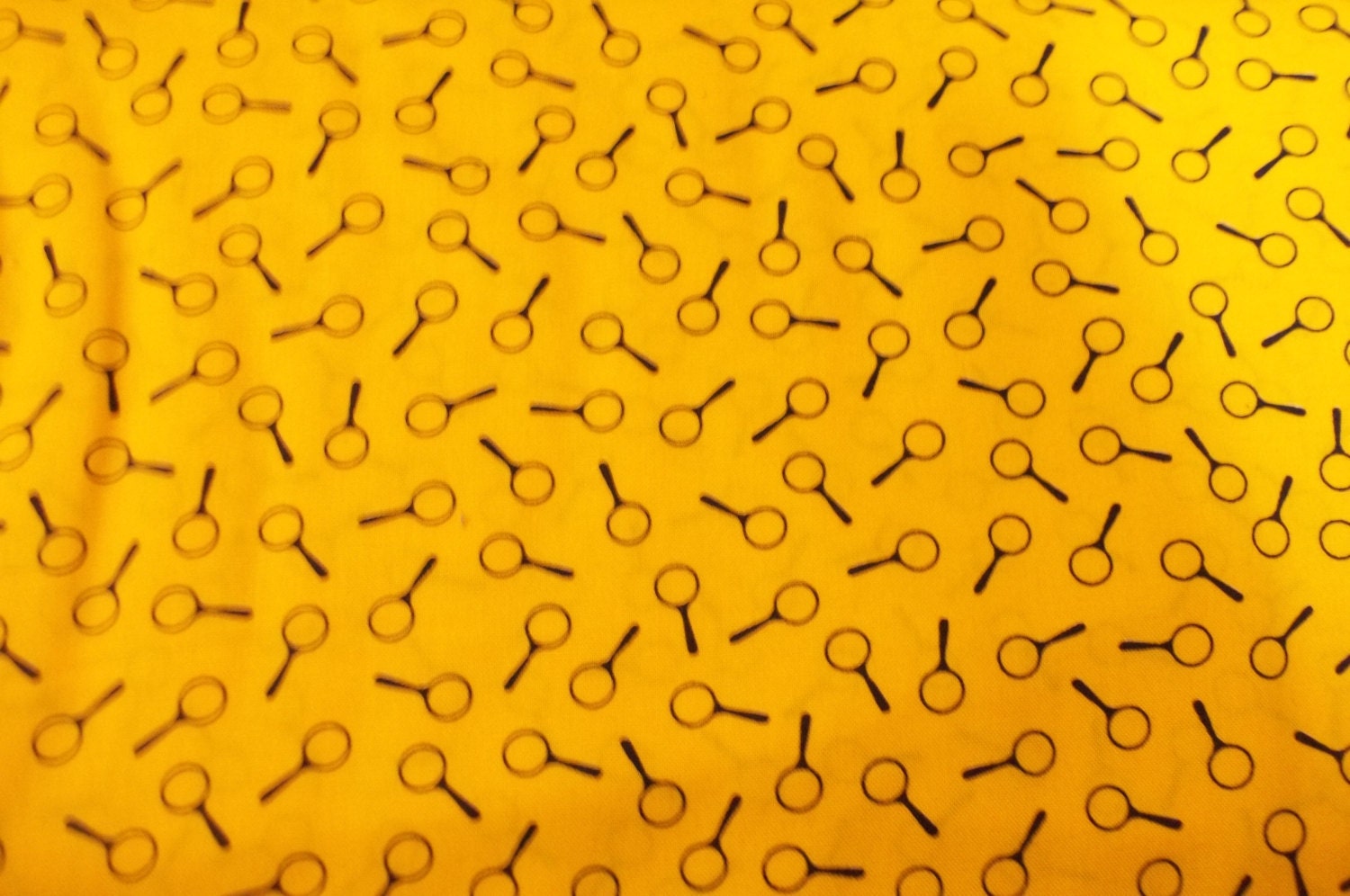 Get a Clue with Nancy Drew By Moda Her Magnifying glass on yellow background 1 yard quilt fabric