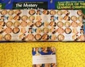 Get a Clue with Nancy Drew collection with Charm Pack  By Moda 1 panel and 3 , 1/2 yard cuts faces, magnifying glass, and books