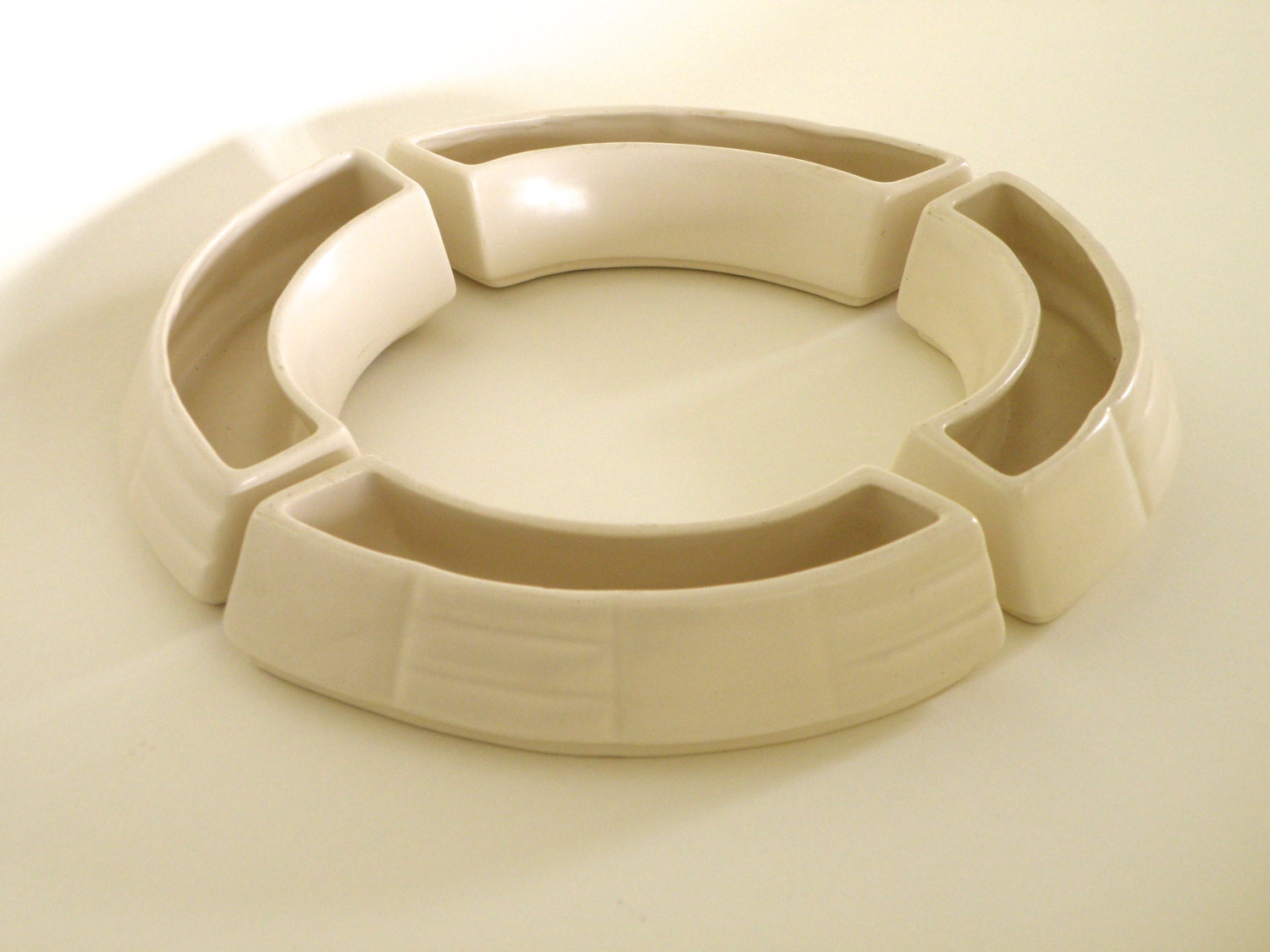 Ivory Ceramic Circular 4 Piece Vase Set