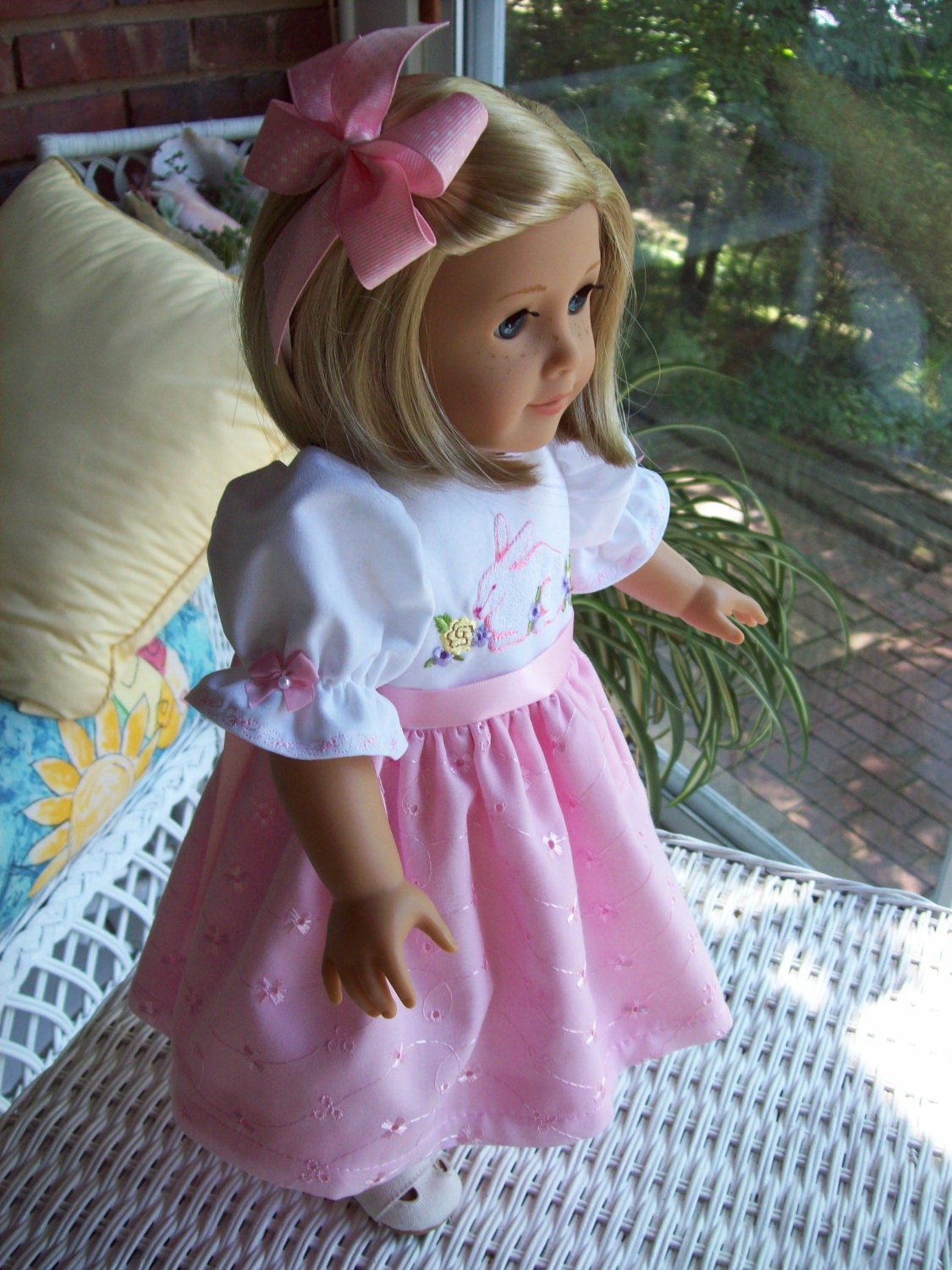 Pink eyelet dress  and hair clip fits 18 inch doll or American Girl doll.