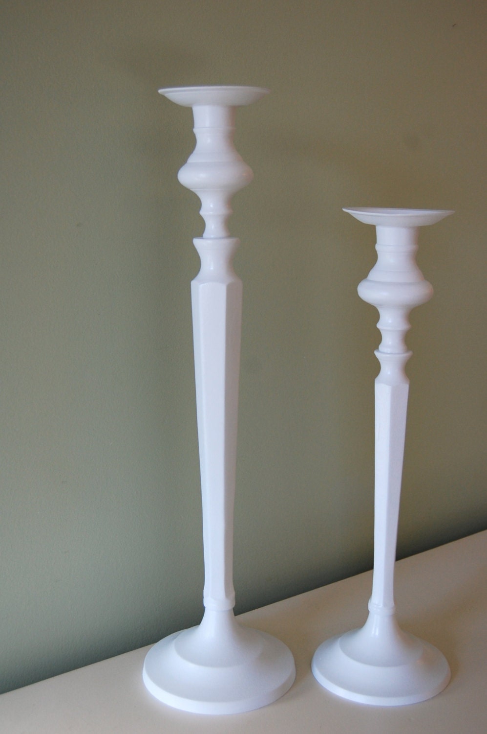 Elegant set of metal candle sticks with a classic romantic appeal for Wedding or Home