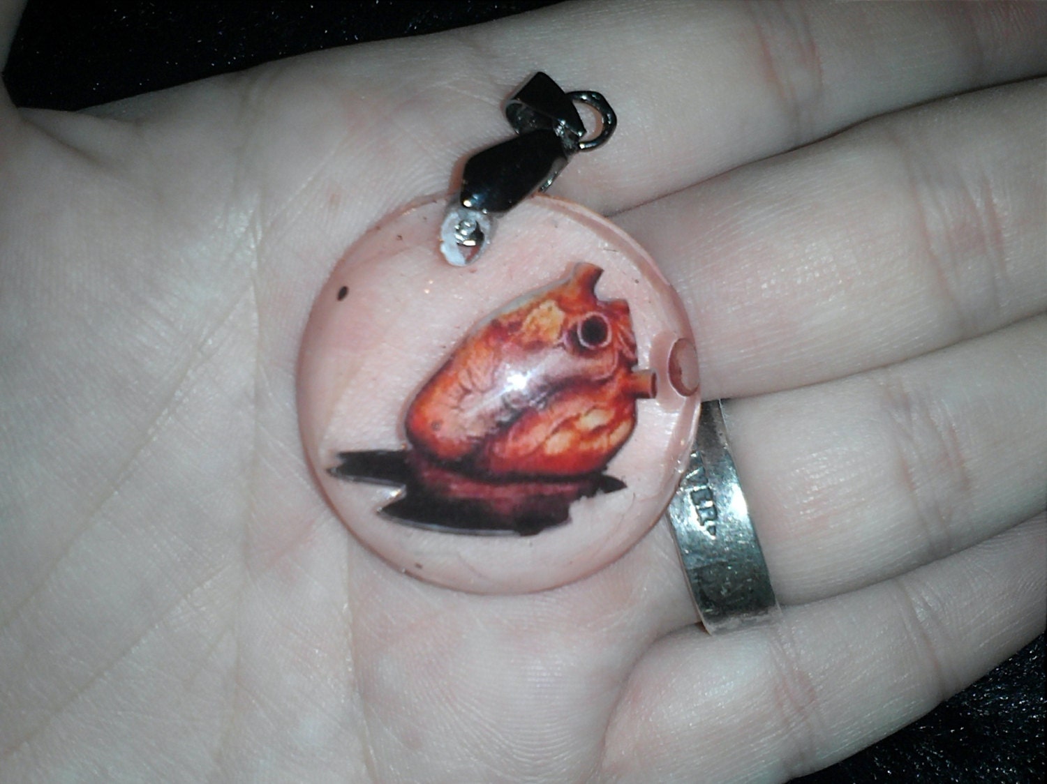 Bleeding human heart necklace