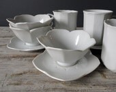 Set of Two Porcelain Lotus Bowls and Plates