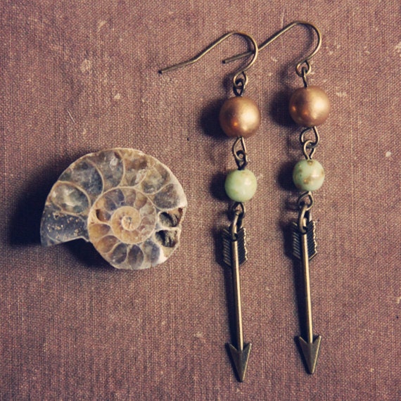 leona.  a pair of bohemian beaded arrow earrings.