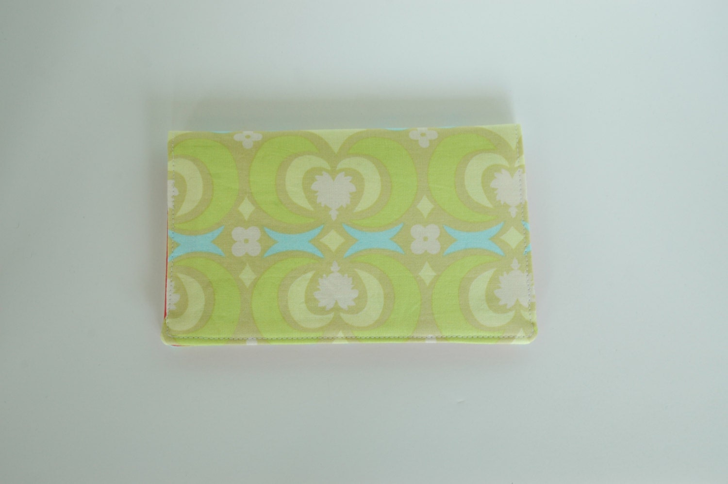 checkbook cover - green/blue print with pink pockets