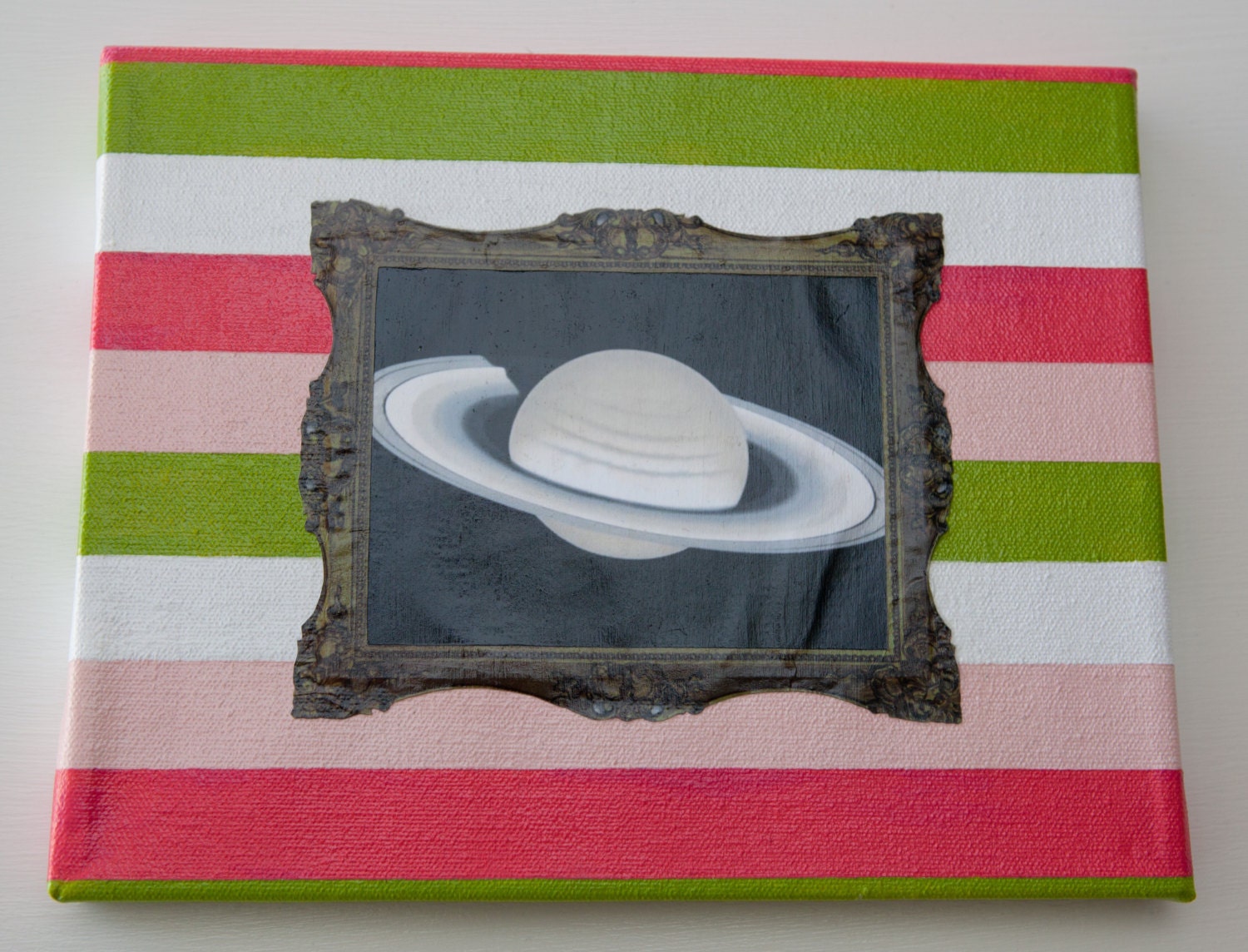 Saturn collage on canvas