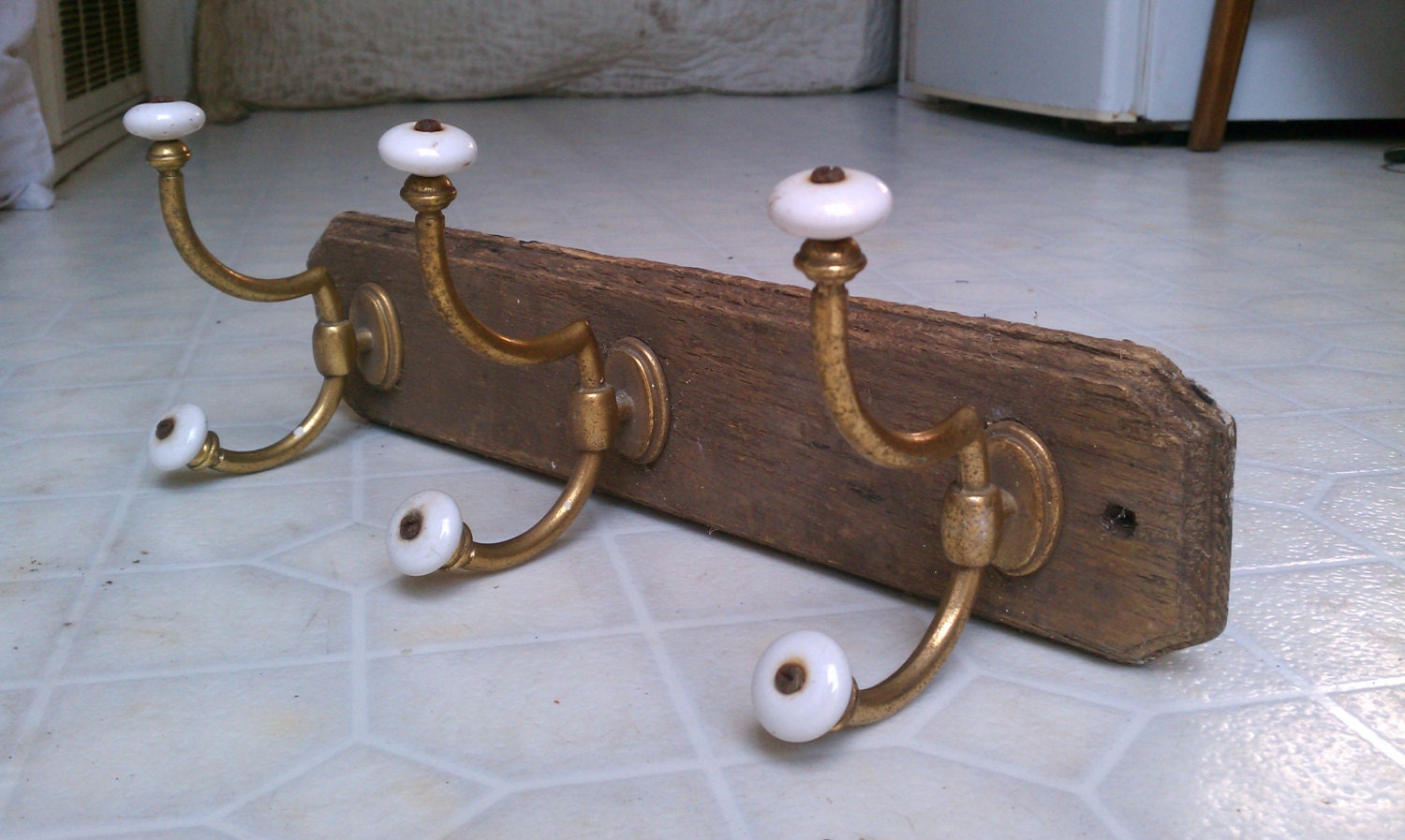 Primitive Brass and Porcelain Set of Hooks