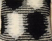 Black, White, and Pink Crocheted Pillow