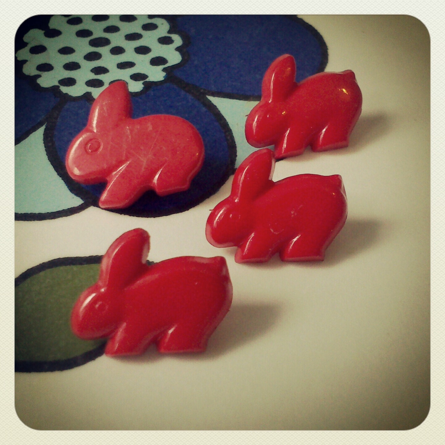 A Set of Four Vintage Red Bunny Buttons