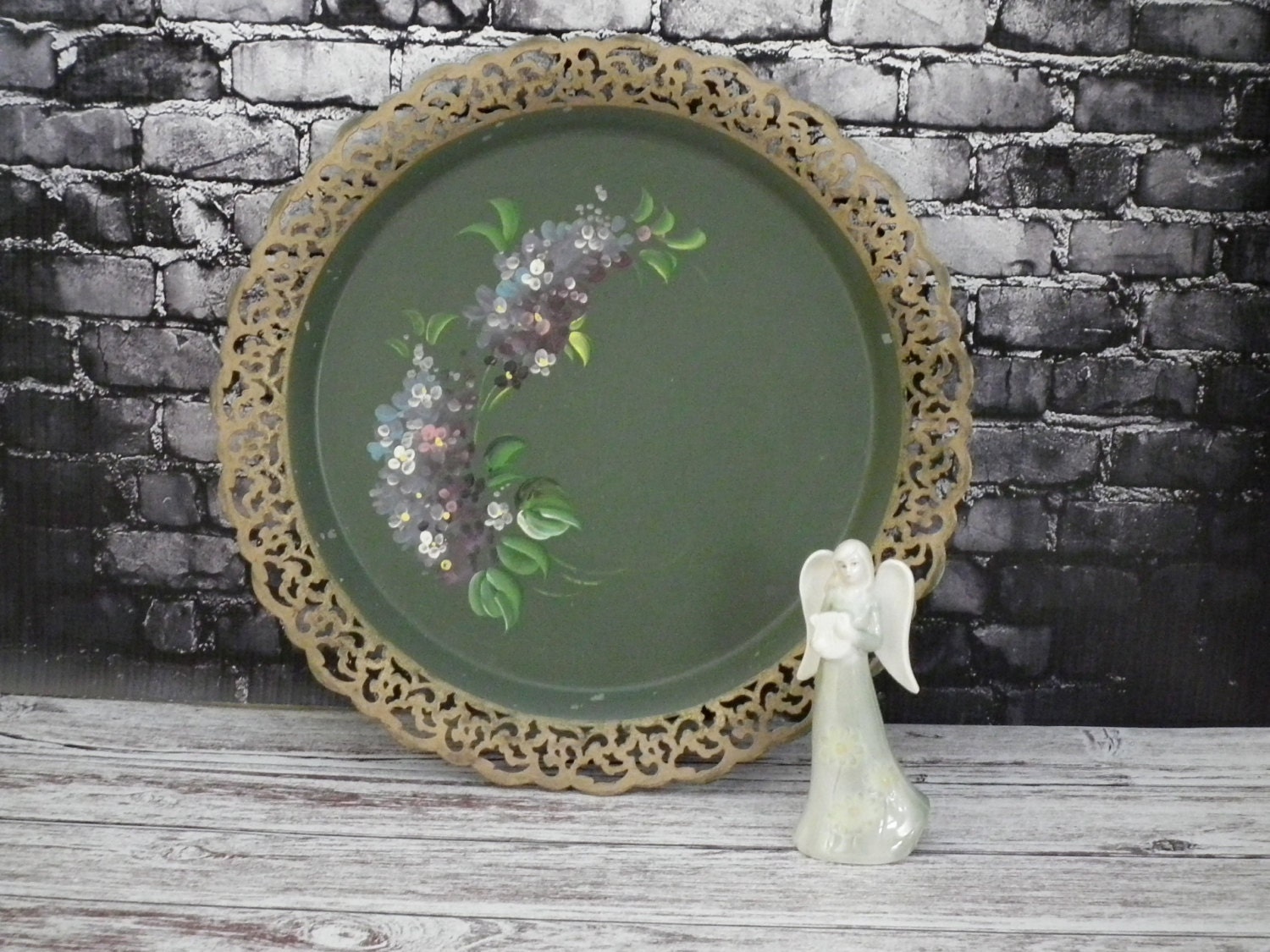Round green tole tray with handpainted purple flowers