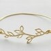 Gold leaf bangle. One gold leaf bangle.