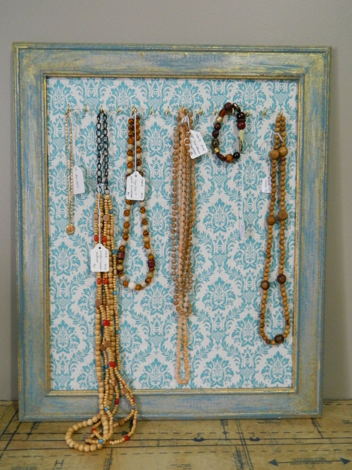 Distressed Upcycled Jewelry Organizer and Display from Vintage Frame and Fabric