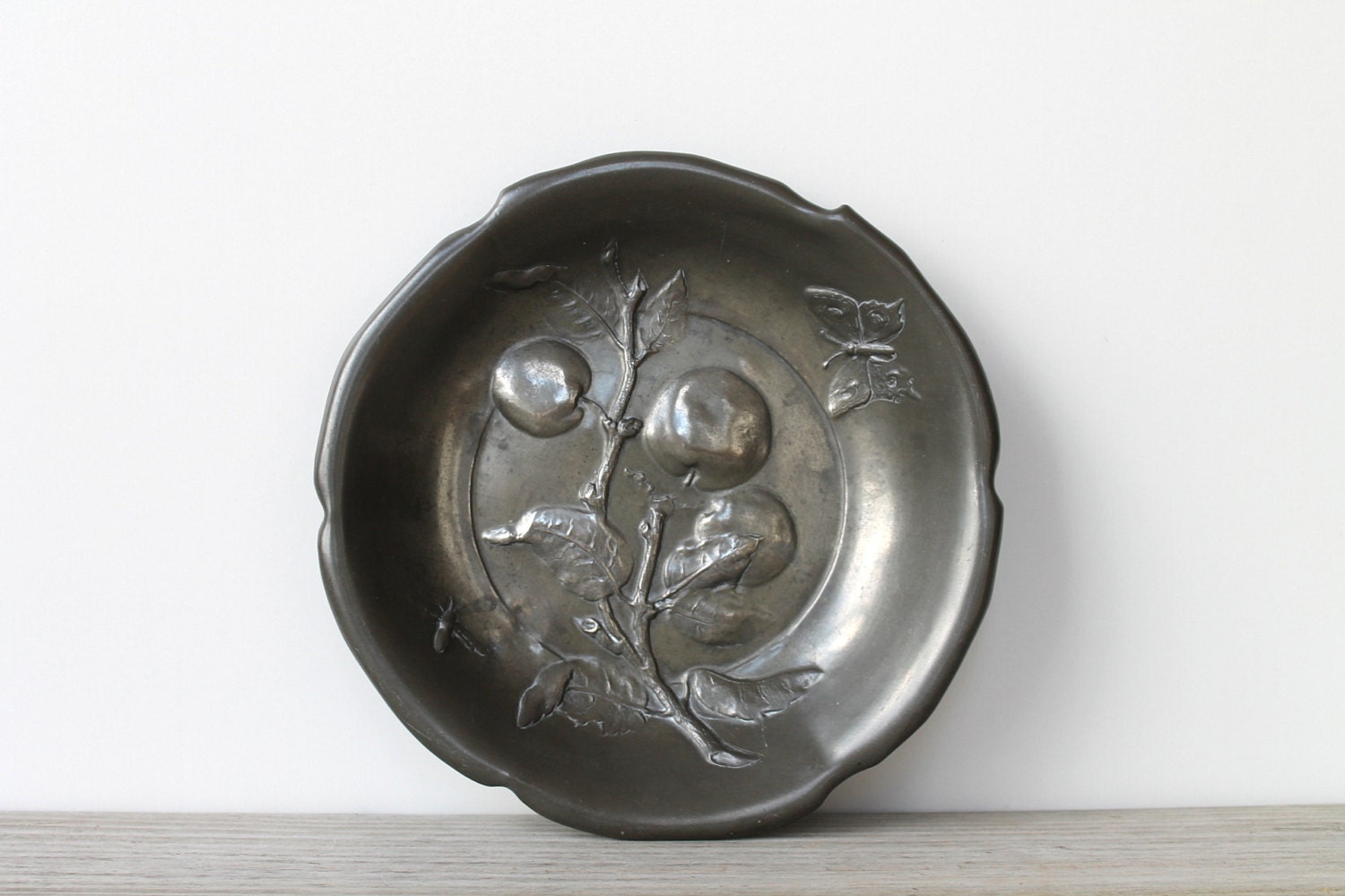 Vintage cast metal plate / pewter gray / apple / dragonfly / butterfly / fruit bowl / farm house decor / rustic / cabin kitchen wall decor