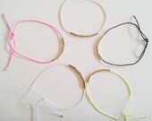 Sunlight bracelet/ nylon cord and raw brass tube